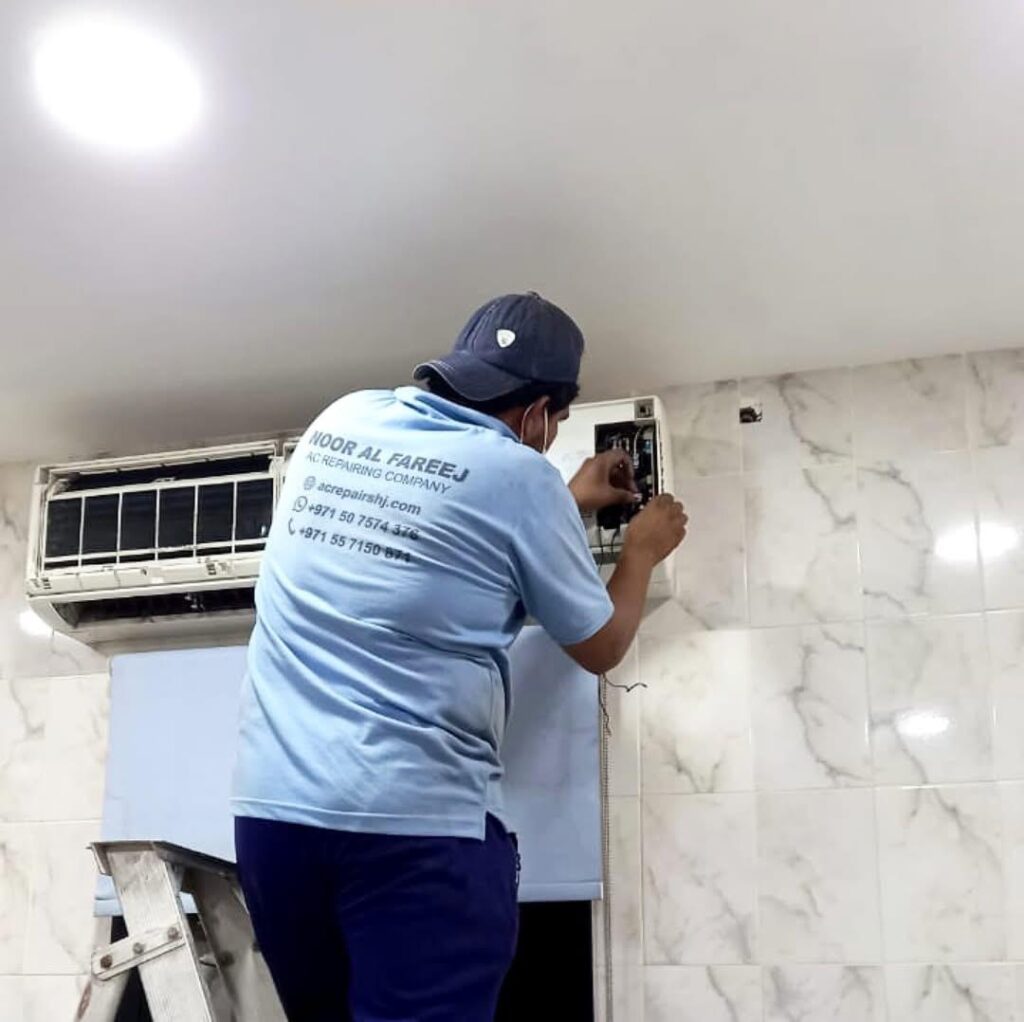 AC technician carefully inspecting air conditioning compressor during routine service