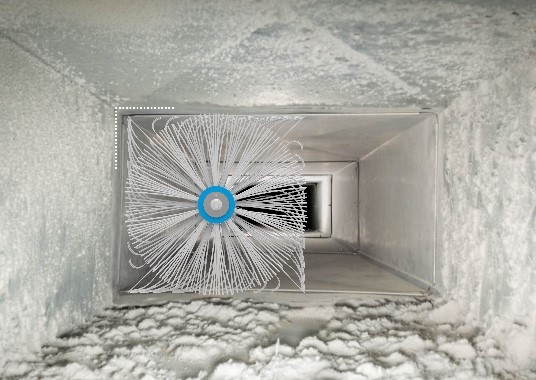 Air duct cleaning specialist removing dust buildup from ceiling vents in Sharjah apartment
